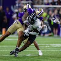 Revamped Washington begins life in the Big Ten with 35-3 win over Weber State